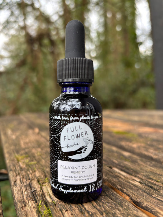 A one ounce bottle of Relaxing Cough Remedy, an herbal remedy for a dry cough